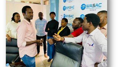 WASAC staff discussing during training