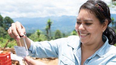 Woman in Honduras testing the quality of water