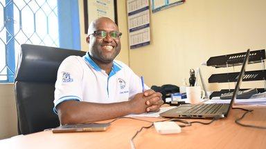 Male staff member Mid Western Umbrella Uganda