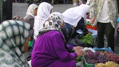 Women selling vegetables and fruit on a market in the Middle East