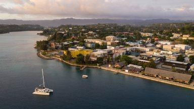 Port Villa waterfront and business district with catamaran in Vanuatu capital city in the south Pacifi