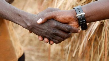 Shaking hands in Uganda