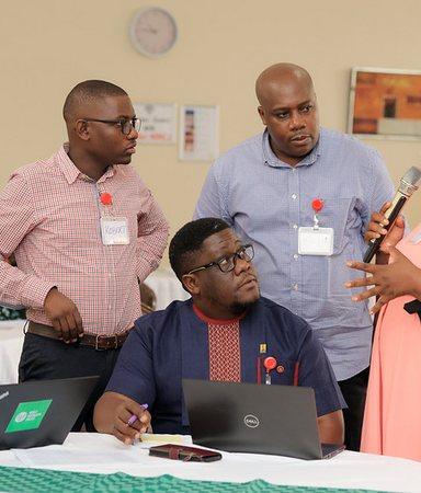 Participants discussing at the National WASH Building Blocks Reflection in Uganda