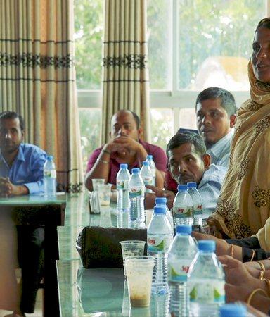 Kohinoor Begum, who submitted a successful petition to the local government to install a borehole in her community, participates in district budget allocations for the sector in Bhola, Bangladesh