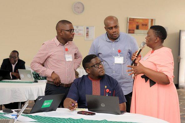 Participants discussing at the National WASH Building Blocks Reflection in Uganda