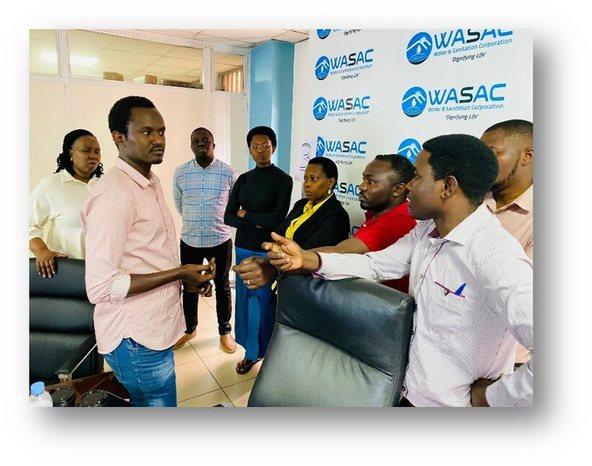 WASAC staff discussing during training