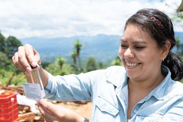 Woman in Honduras testing the quality of water
