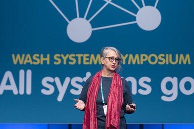 Barbara Schreiner CEO of the Water Integrity Network on stage of the All Systems Go symposium 2019
