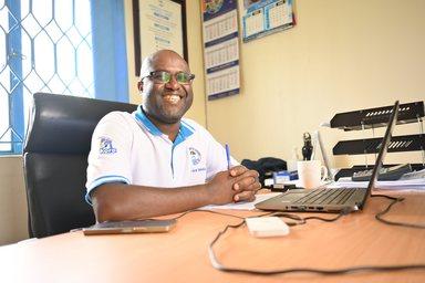 Male staff member Mid Western Umbrella Uganda