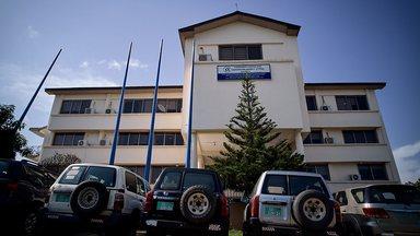 Ghana's CWSA head office outside facade with parked cars in front