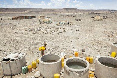 Girl fetching water in pastoralist community in Afar region Ethiopia