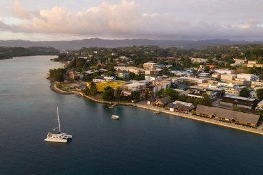 Port Villa waterfront and business district with catamaran in Vanuatu capital city in the south Pacifi