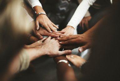 Hands on top of each other