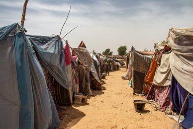 Refugee camp in Africa, full of people who took refuge due to insecurity and armed conflict. People living in very poor conditions, lack of food, clean water and proper shelter to stay
