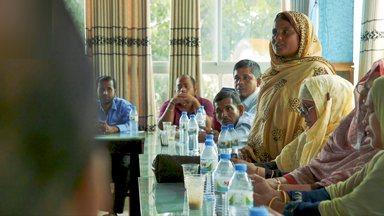 Woman in Bangladesh speaking in a meeting