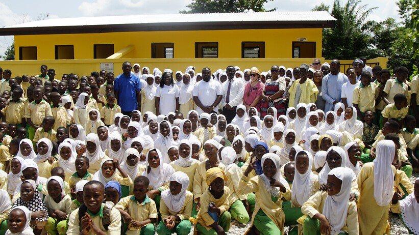 beneficiary_young_learners_of_duayaw_nkwanta_islamic_school_together_with_the_officials_in_front_of_the_wash_faciities_after_the_commissioning
