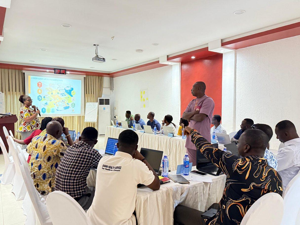Co-creating solutions WASH Systems Strengthening session with district partners.