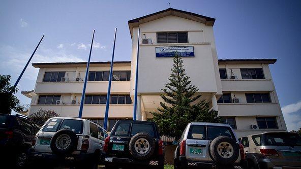 Ghana's CWSA head office outside facade with parked cars in front