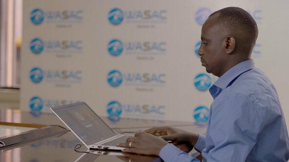 Moise Irankunda, a Geographic Information System (GIS) Specialist at the Water and Sanitation Corporation (WASAC),